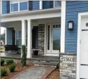  ?? JEAN BONCHAK FOR THE NEWS-HERALD ?? Thousands of visitors to the 2018 Lake County YMCA Dream House in the Lakeshore Highlands Developmen­t in Mentor will use the pictured walkway leading to the home’s front door.