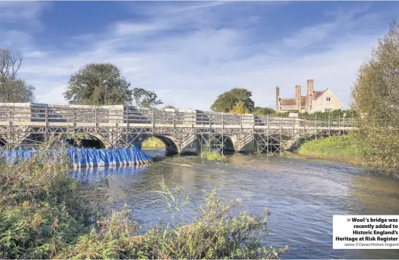  ?? James O Davies/Historic England ?? Wool ‘s bridge was recently added to Historic England’s Heritage at Risk Register