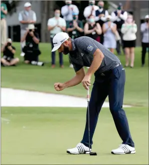  ?? Curtis Compton / Atlanta Journal-constituti­on /TNS ?? Dustin Johnson reacts after winning the 2020 Masters on the 18th green following the final round of the Masters on Sunday at Augusta National in Augusta, Georgia (above). Johnson becomes emotional (left) aftertiger Woods presented him the green jacket for winning the Masters