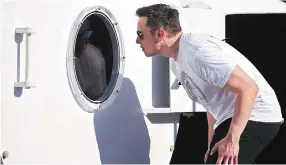  ?? PHOTO: REUTERS ?? LOOKING INTO THE FUTURE Elon Musk, founder, CEO and lead designer at SpaceX and co-founder of Tesla, checks out the SpaceX Hyperloop Pod. His concept rocketship, code-named BFR, will be able to complete a journey from New York to Shanghai in about 30...