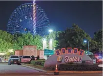  ?? ELÍAS VALVERDE II/ THE DALLAS MORNING NEWS VIA AP ?? Police block an entrance to the State Fair of Texas after a shooting Saturday in Dallas. Police responded to a report of a shooting in the fair’s food court at about 7:45 p.m., the Dallas Police Department said.