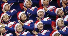  ?? PHOTO: HOW HWEE YOUNG/EPA ?? BRINGING CHEER: North Korean cheerleade­rs do their stuff at the Winter Olympics in South Korea.