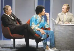  ?? ABC Photo Archives / Getty Images ?? Dick Cavett pairs veteran Hollywood actor Robert Young with young rock star Jimi Hendrix in a 1969 episode of his talk show.