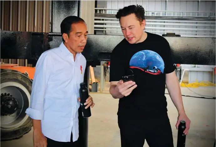  ?? ?? Indonesian President Joko Widodo talks with Founder and CEO of Tesla Motors Elon Musk during their meeting at the SpaceX launch site in Boca Chica, Texas, U.S., May 14, 2022. Image: Reuters