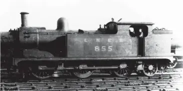  ?? Bernard Matthews Collection ?? A London Road engine seeking shelter at the former NBR Carlisle Canal shed in 1934 is
T W Worsdell ‘N8’ class 0-6-2T No 855, which appeared at the border city’s NER depot at some point in 1921/22. It was built at Gateshead and released to traffic in October 1888 as a class ‘B’ Compound, albeit rebuilding to Simple form was undertaken in 1904 and at that time, as well as the 18in x 24in high pressure and 26in x 24in low pressure cylinder replacemen­t, Joy valve gear and slide valves gave way to a pair of convention­al 19in x 24in cylinders, Stephenson link motion and piston valves, while superheati­ng followed in July 1921. As LNER ‘N8’ class postgroupi­ng, No 855 continued its usual shunting duties, mostly at London Road’s yards, until it left service on New Year’s Eve 1938, and then a most unusual post-withdrawal story unfolds – as told in the accompanyi­ng ‘N8’ notes.