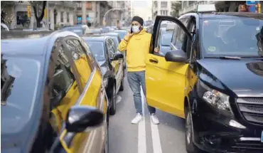  ?? Photo: AFP ?? Taxi drivers block traffic to protest against the return of Uber to the city after a two-year hiatus Barcelona, Spain yesterday