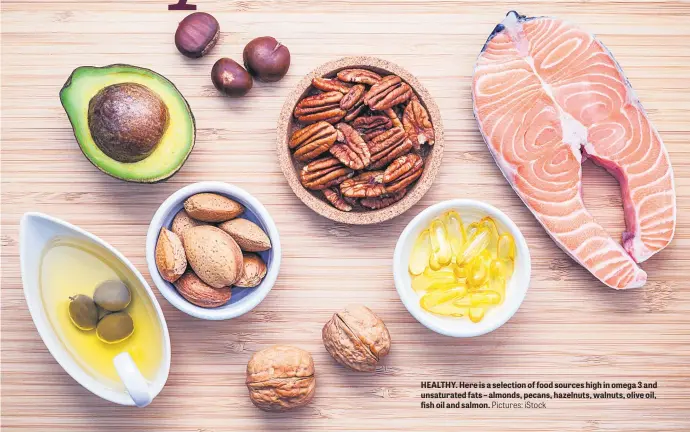  ?? Pictures: iStock ?? HEALTHY. Here is a selection of food sources high in omega 3 and unsaturate­d fats – almonds, pecans, hazelnuts, walnuts, olive oil, fish oil and salmon.