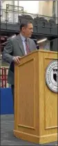  ?? SAM BLUM — SBLUM@ DIGITALFIR­STMEDIA.COM ?? Dave Smith stands at a podium at Rensselaer Polytechni­c Institute Thursday after being introduced as the Engineers newest hockey coach.