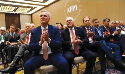  ?? (Sarah Silbiger/Reuters) ?? HOUSE GOP leader Rep. Kevin McCarthy (front, left) attends an America First Policy Institute summit in Washington, in July.