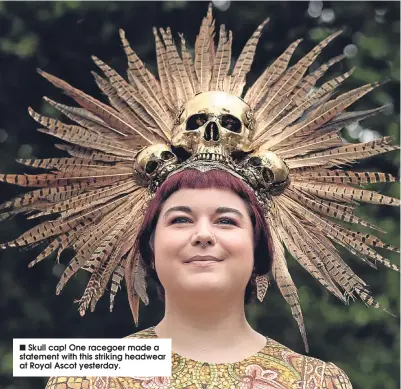  ??  ?? Skull cap! One racegoer made a statement with this striking headwear at Royal Ascot yesterday.