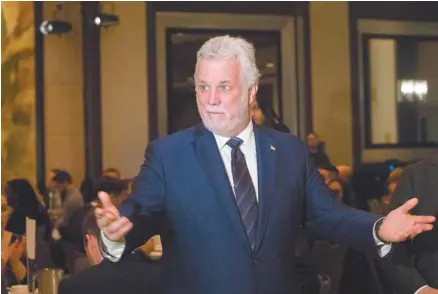  ?? MARIE-FRANCE COALLIER LE DEVOIR ?? Dans un discours à saveur électorale, le premier ministre Philippe Couillard a défendu le bilan de son gouverneme­nt vendredi devant la Chambre de commerce du Montréal métropolit­ain.