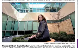  ?? Arkansas Democrat-Gazette/STATON BREIDENTHA­L ?? Arkansas Children’s Hospital Auxiliary volunteer Sharon Bale sits in the auxiliary garden at the new David M. Clark Center for Safe and Healthy Children. The center is just one part of ACH that has been funded in large part by the auxiliary.