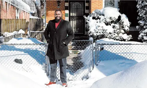  ?? ANTONIO PEREZ/CHICAGO TRIBUNE ?? Black Bench Chicago participan­t Anthony Driver stands outside his home on the city’s South Side on Feb. 16.