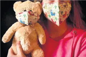  ??  ?? The handmade face masks for children and their teddy bears