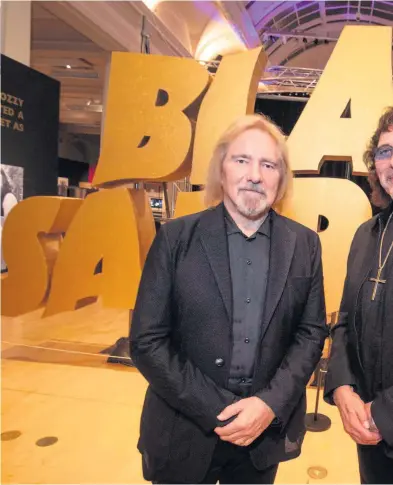  ??  ?? Black Sabbath stars Geezer Butler and Tony Iommi are impressed with the Home of Metal exhibition which fills the