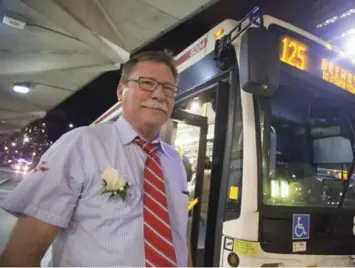  ?? BERNARD WEIL/TORONTO STAR ?? TTC bus driver Al Nywening drives his last shift after 42 years of driving for the commission.