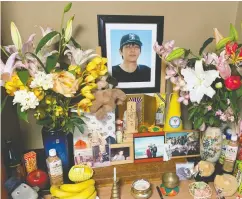  ??  ?? A shrine honours Kazuya Ohata at his parents’ home in Kanazawa, Japan. He died at age 40 after being physically restrained in a psychiatri­c institutio­n. The Ohata
family has successful­ly sued the institutio­n.