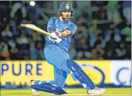  ??  ?? Shikhar Dhawan plays a shot during the first ODI match at Rangiri Dambulla Internatio­nal Cricket Stadium in Dambulla, Sri Lanka, on Sunday