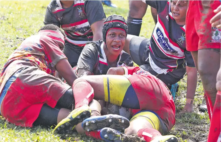  ?? Photo: ?? Try Time...
Naitasiri Women’s rugby rep Me Navue looks to the referee after scoring their first try against Namosi during the Skipper Cup clash at Thomson Park, Navua on August 8, 2020. Naitasiri won 33-10 but coach Elenoa Kunatuba was not happy with the ground conditions as they now turn their focus on Nadroga.