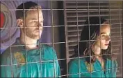  ?? Ian Watson Syfy ?? A NEW “Killjoys” episode has John (Aaron Ashmore) and Dutch (Hannah John-Kamen) in a prison.