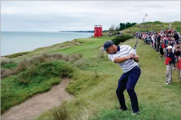  ?? AP PHOTO BY CHARLIE NEIBERGALL ?? Team USA’S Bryson Dechambeau hits on the third hole during a practice day at the Ryder Cup at the Whistling Straits Golf Course Tuesday, Sept. 21, in Sheboygan, Wis.