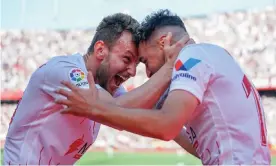  ?? Photograph: Francis González/Sopa Images/Shuttersto­ck ?? Sevilla’s Munir el Haddadi (right) celebrates with Ivan Rakitic after scoring his side’s second goal in their derby victory over Real Betis