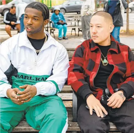  ?? NICOLE RIVELLI/FOCUS FEATURES ?? Rapper Bashar “Pop Smoke” Jackson, left, and director Eddie Huang on the set of “Boogie.”