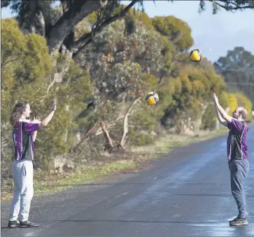  ?? Picture: PAUL CARRACHER ?? REMAINING FIT: Phantoms volleyball­ers Jack Hannan, left, and Nathan Berry have adopted physically distanced training methods during the latest COVID-19 lockdown.