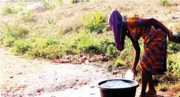  ??  ?? There is no pipe borne water, and where they get Okobo residents scoop contaminat­ed water