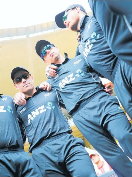  ?? Photo / Photosport ?? Mitchell Santner (centre) hasn’t played for the Black Caps since March.