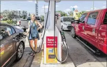 ?? ALLEN EYESTONE / THE PALM BEACH POST ?? Palm Beach County’s average for a gallon of regular stood at $2.43 Tuesday, up from $2.42 a week ago. The Florida average remains at $2.31 a gallon, AAA reports.