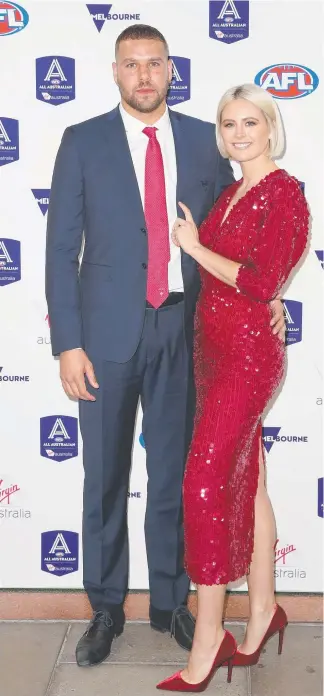  ?? Picture: GETTY IMAGES ?? Hawthorn star Lance Franklin and wife Jesinta last night.