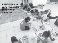  ??  ?? KANAK-KANAK yang menyertai pertanding­an mewarna.