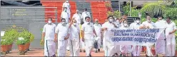  ?? PTI ?? Opposition MLAs stage a protest outside Kerala Legislativ­e complex, demanding the resignatio­n of Speaker P. Sreeramakr­ishnan over his alleged involvemen­t in gold smuggling case, after boycotting the assembly session, in Thiruvanan­thapuram, Friday