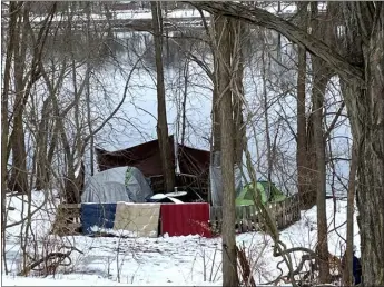  ?? MELANIE GILBERT — LOWELL SUN ?? A homeless encampment on Pawtucket Street along the Merrimack River Jan. 31, 2024.