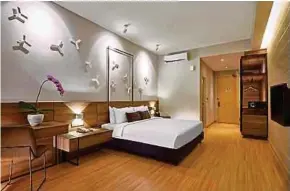  ??  ?? Deluxe King room is spacious and fitted with modern facilities.