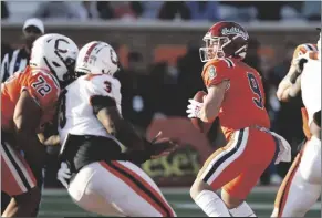  ?? BUTCH DILL VIA AP ?? NATIONAL QUARTERBAC­K JAKE HAENER, OF FRESNO STATE (9), throws a pass during the second half of the Senior Bowl football game on Saturday in Mobile, Ala..