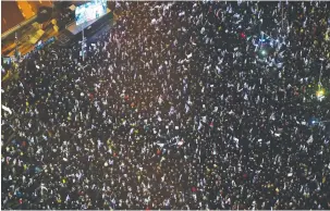  ?? (Tomer Neuberg/Flash90) ?? PROTESTERS DEMONSTRAT­E against the proposed changes to the legal system in Tel Aviv last night.