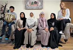  ??  ?? One of the family: Katie Freeman (third right) with the Alvis in ‘My Week as a Muslim’