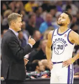  ?? RICH PEDRONCELL­I — THE ASSOCIATED PRESS ?? Warriors head coach Steve Kerr, left, and star guard Stephen Curry are in agreement that the team needs to sharpen its focus after an uninspired road trip.