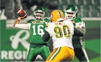  ?? CP PHOTO ?? Saskatchew­an Roughrider­s quarterbac­k Brandon Bridge attempts a pass against the Edmonton Eskimos during a Nov. 4 game in Regina.