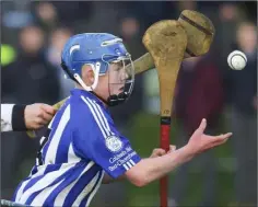  ??  ?? Goalscorer Cian Byrne testing the St. Kieran’s defence.