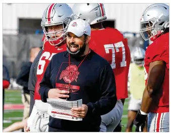  ?? PAUL VERNON / AP ?? Coach Ryan Day at practice in Columbus on April 5. “I think the idea is we are going to break up the teams and go Scarlet and Gray, at least for a half of football,” Day said early this week.