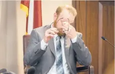  ?? STEPHEN B. MORTON/AP ?? Travis McMichael reacts to questions during testimony Wednesday in Brunswick, Ga. McMichael, his father and a neighbor are accused of murder.