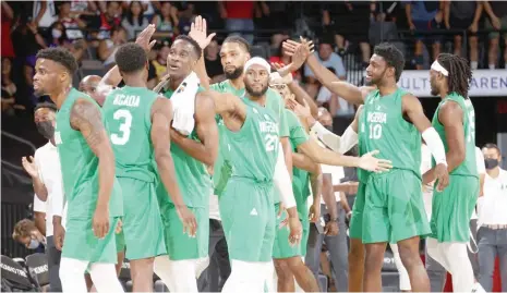  ??  ?? D’Tigers players celebrate after their historic win over USA last Saturday in Las Vegas, USA