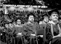  ?? JACOB LANGSTON/STAFF FILE PHOTO ?? UCF has aimed for a 4-year graduation rate of 50 percent but now wants to switch to 47.8 percent. Fall enrollment is likely to top 67,000.