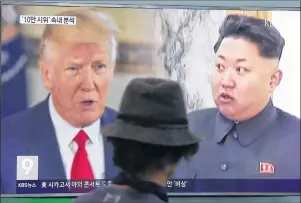  ?? AP PHOTO ?? A man watches a television screen showing U.S. President Donald Trump, left, and North Korean leader Kim Jong Un during a news program at the Seoul Train Station in Seoul, South Korea, Thursday.