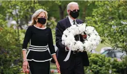  ?? Patrick Semansky / Associated Press ?? Former Vice President Joe Biden and wife Jill Biden lay a wreath at the Delaware Memorial Bridge Veterans Memorial Park on Monday in New Castle, Del.