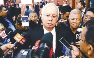  ?? BERNAMAPIX ?? Najib speaking to reporters in the Dewan Rakyat yesterday where he said he had no knowledge that the super yacht Equanimity was purchased with 1MDB funds.