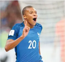  ?? | AP ?? Kylian Mbappé consiguió su primer gol con Francia el mismo día en que se convirtió en jugador del PSG.